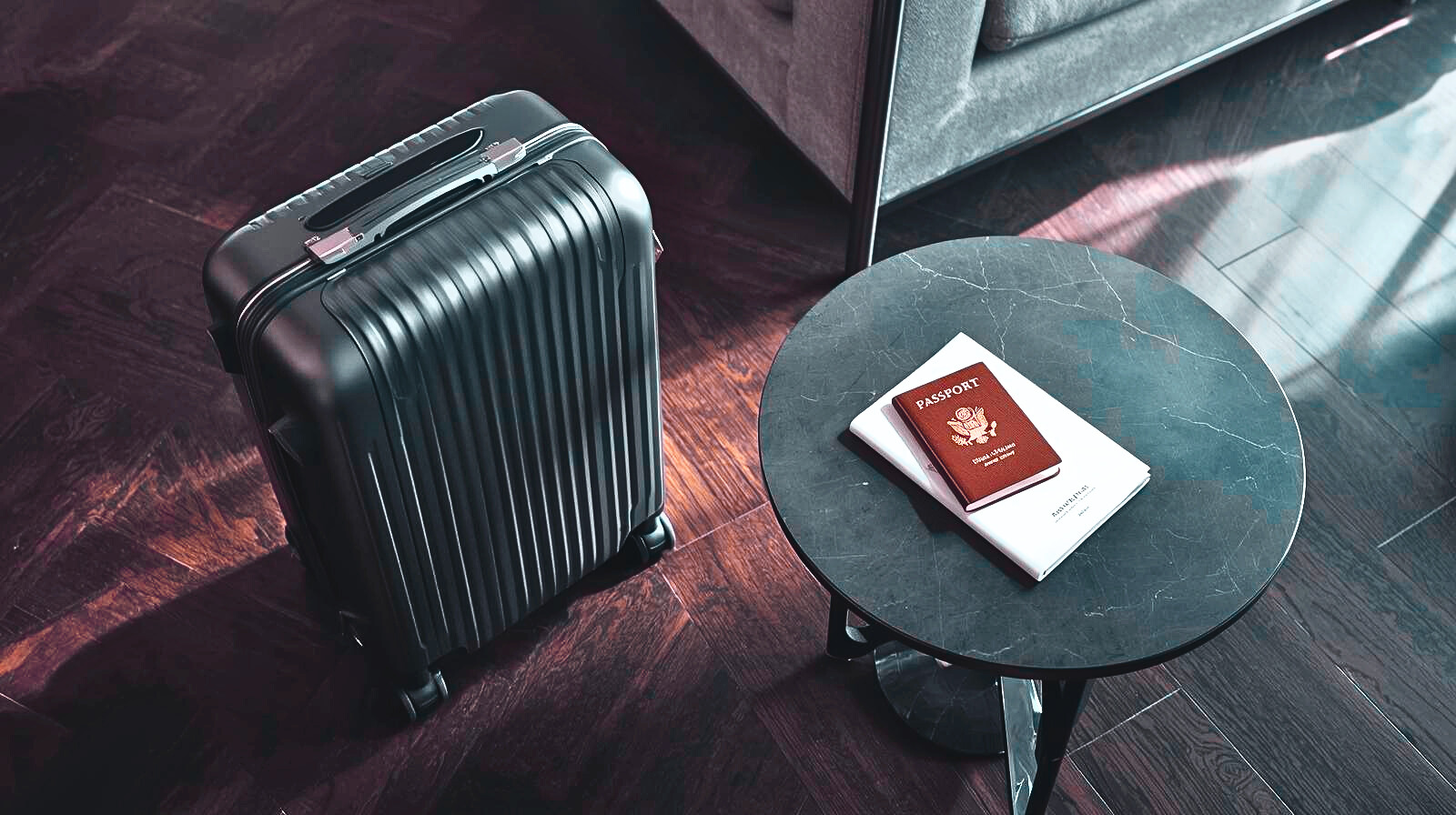 Suitcase next to small table